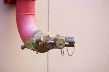 Fire sprinklers and red pipeの写真素材