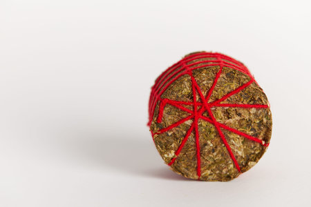 Thai Stick Cannabis marijuana on white background, Red thread Thai stick marijuana flower