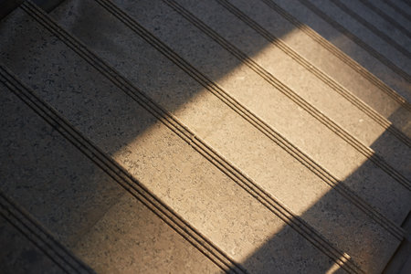 Concrete stairs with shadow and sunlight in the morningの写真素材