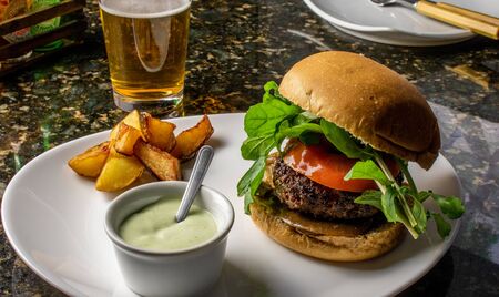 At night, bar food, burger and beer. At Night, Bar Food, Burger and Beerの写真素材