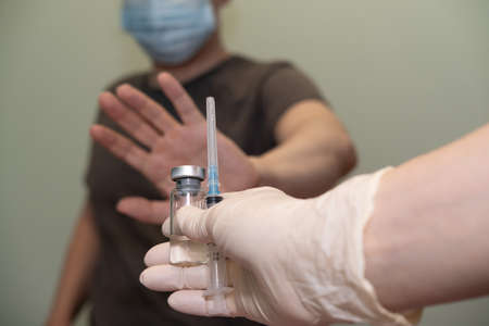 the patient does not agree to put the vaccine, vaccination. anti-vaccinationの写真素材