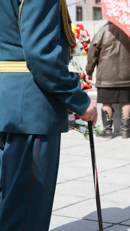 Yekaterinburg, Russia-May 9, 2012: War veteran with a cane stands on the squareのeditorial素材