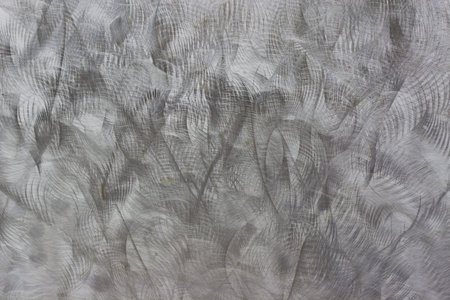 A silver brushed metal background texture の写真素材