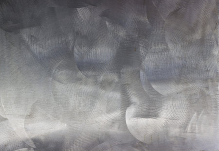 A silver brushed metal background texture の写真素材