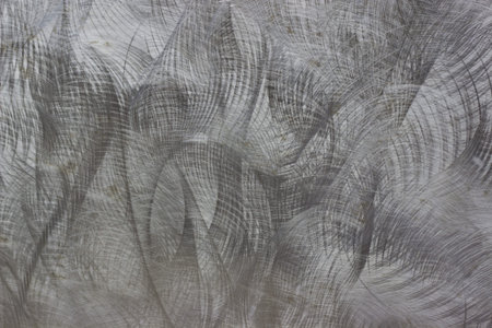 A silver brushed metal background texture の写真素材