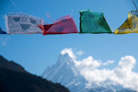 Buddhist prayer flags in the Himalaya mountains, Annapurna Base Camp Area, in Nepal.の写真素材