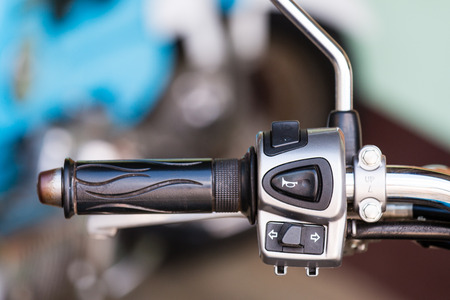 The control button on motorcycle handlebar.の写真素材