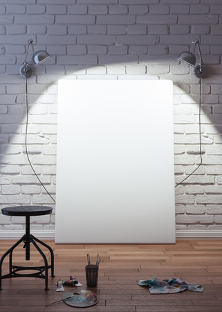 Artistic equipment in a artist studio: empty artist canvas on floor and paint brushes 3d renderの写真素材