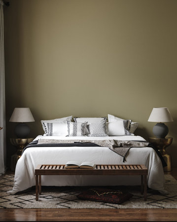 Interior of a modern bedroom with a wooden bed, lamp and a carpet