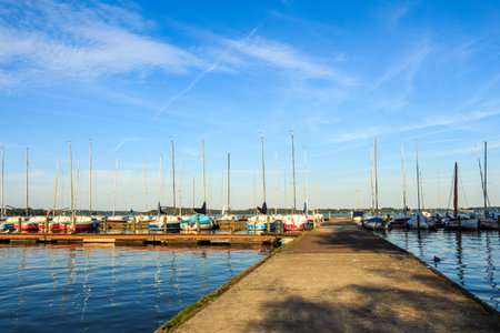 Harbour with standing sailboats and clear blue sky. travelling and vacation themeの写真素材