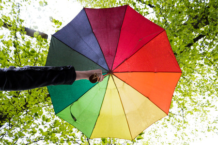 Colored umbrella can be used for optimism, colors, rain, outsides, weather themesの写真素材