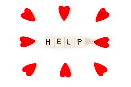 Help and red hearts. can be used for help,  love, charity, couple, refugees, aid and heart themesの写真素材