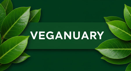 Vegan friendly text with green leaves on dark green background. Ecology conceptの素材