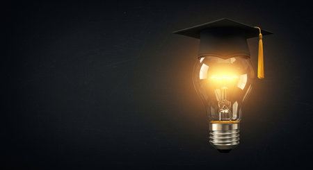 Conceptual image with lightbulb and graduation cap. Mixed mediaの素材