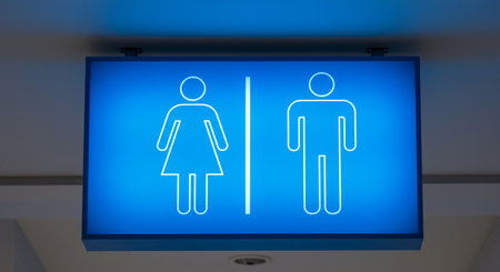 Blue male and female toilet sign on a wall. 3D renderingの素材