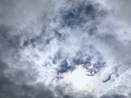 The Sun Behing the Clouds