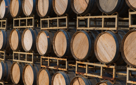 Rown of wine barrels on a a standの写真素材