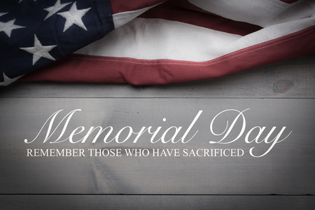 The flag of the United Sates of America on a grey plank background with memorial dayの写真素材