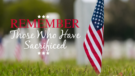 Small American flags and headstones at National cemetary- Memorial Day display - with copyの写真素材