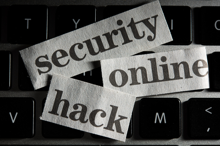 An Online Security Concept with cut out words from newspaper, newspringの写真素材