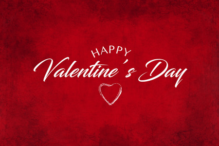 A red Valentines Day card with greeting and a sketched heartの写真素材