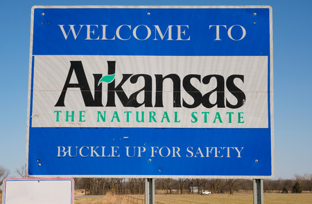 Welcome to Arkansas - the Natural Sate in front of blue skyの写真素材