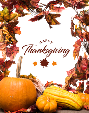 Fall, autumn pumpkins, leaves and veggies on a wooden background. Thanksgiving theme.の写真素材