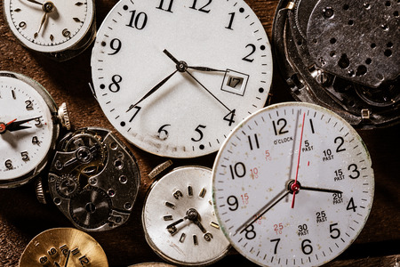 Old, vintage watch faces making a background. Time conceptの写真素材