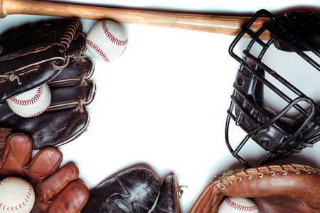 A group of vintage baseball equipment on a white backgroundの写真素材