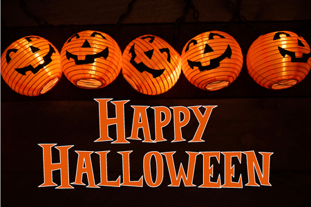 Halloween decoration and greeting with jack-o-latern lightsの写真素材