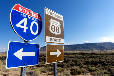 a group of Highway markers on historic highway 66 and interstate 40 in the American southwestの写真素材