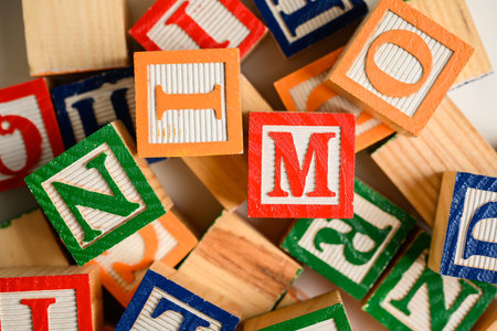 A colorful group of childrens, wooden letter blocksの写真素材