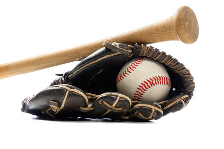 Baseball equipment including a leather glove, a ball and a wooden batの写真素材
