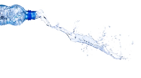 Fresh water splashing out of bottle, isolated on white background の写真素材