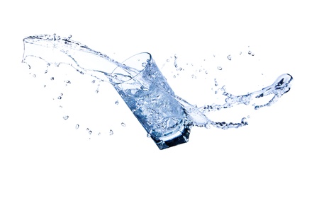 Fresh water splashing out of glass, isolated on white backgroundの写真素材