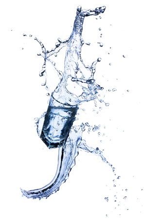 Fresh water splashing out of glass, isolated on white background の写真素材
