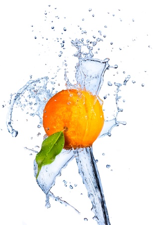 Fresh oranges with water splash, isolated on white background の写真素材