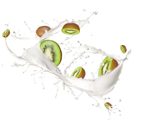 Kiwi in cream splash, isolated on white background の写真素材