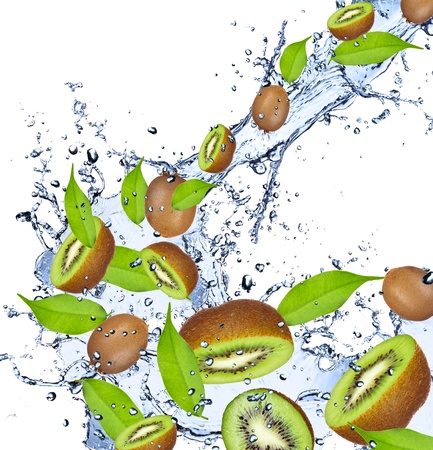 Fresh kiwis falling in water splash, isolated on white background の写真素材