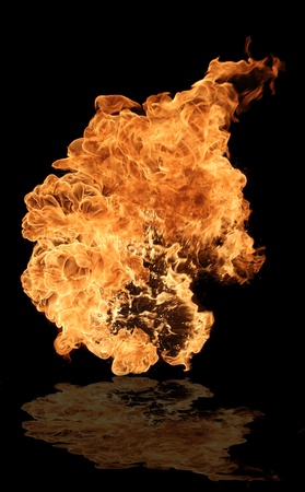 Fire flame with water reflectionの写真素材