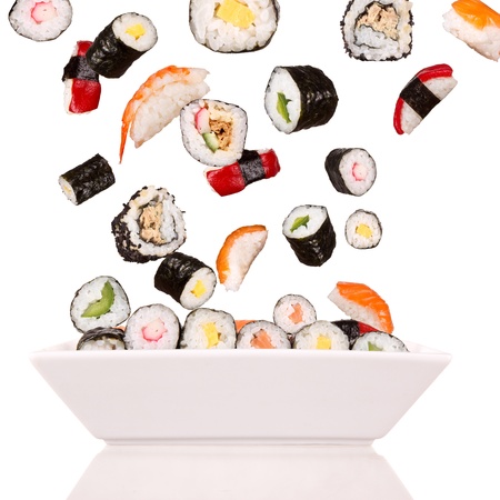 Delicious pieces of sushi, isolated on white backgroundの写真素材