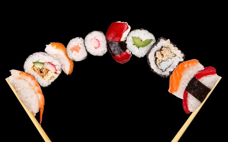 Maxi sushi, isolated on black backgroundの写真素材