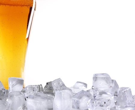Beer glass with ice cubes の写真素材