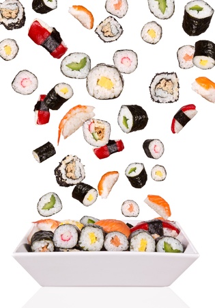 Delicious pieces of sushi, isolated on white background の写真素材