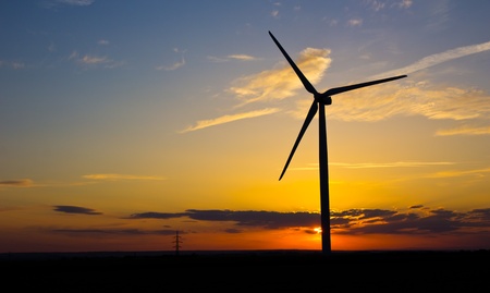 Windmill in evening sunsetの写真素材