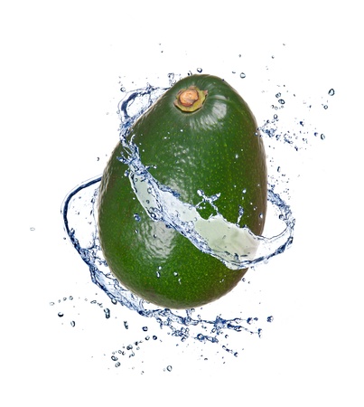 Avocado in water splash, isolated on white backgroundの写真素材