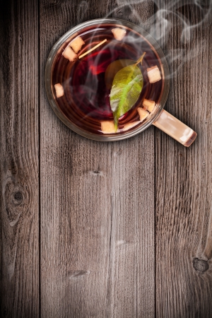 Top view of fruit tea on wooden plank tableの写真素材