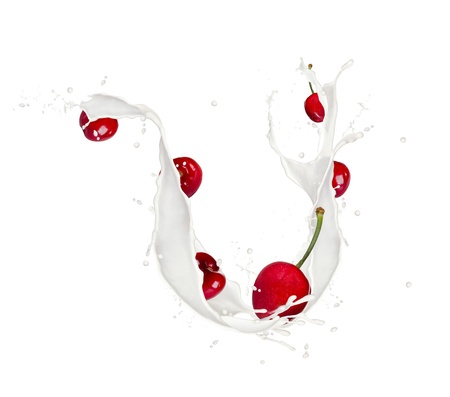 Cherries in milk splash, isolated on white backgroundの写真素材