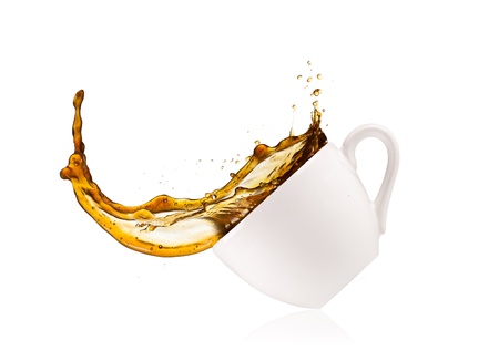 Coffee splashing out of cup, isolated on white backgroundの写真素材