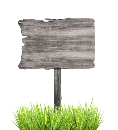 Wooden empty sign in grass, isolated on white backgroundの写真素材